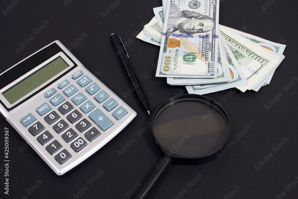 Fototapeta premium money with calculator