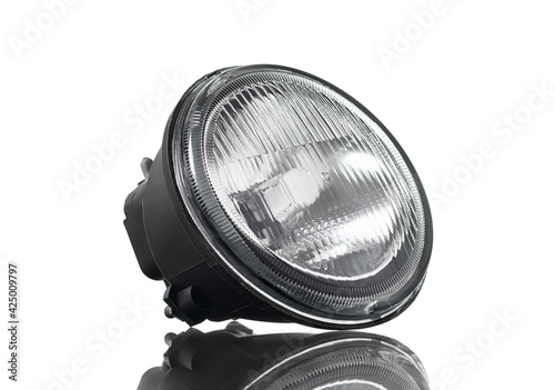 New fog headlight isolated on white background. Automotive parts.