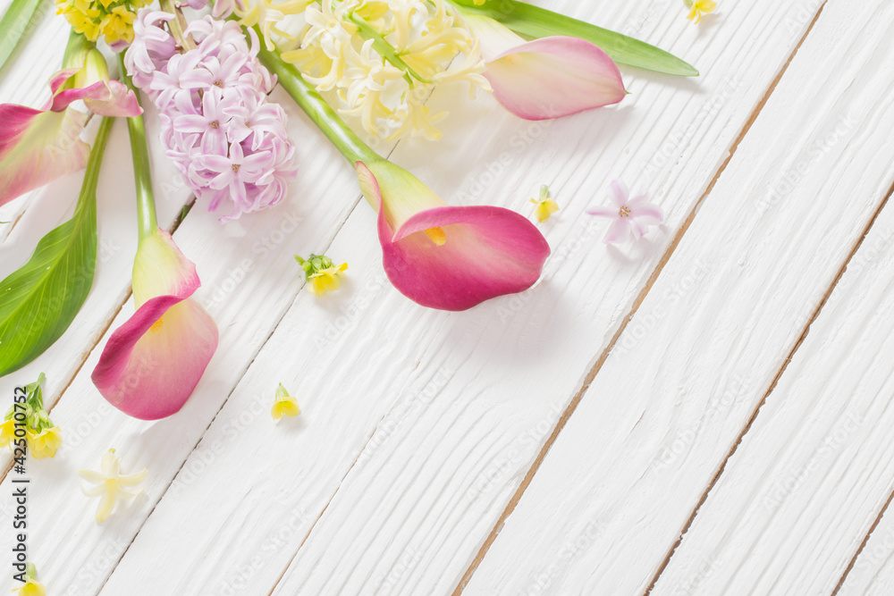 beautiful flowers on white wooden background beautiful flowers on white wooden background
