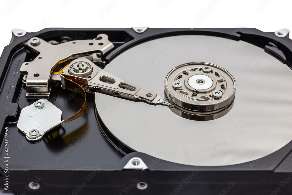 Close up of hard disk hard disk magnetic tape inside, open cover hard disk in computer or server on white background. Technology background. Close up of hard disk hard disk magnetic tape inside, open cover hard disk in computer or server on white background. Technology background.