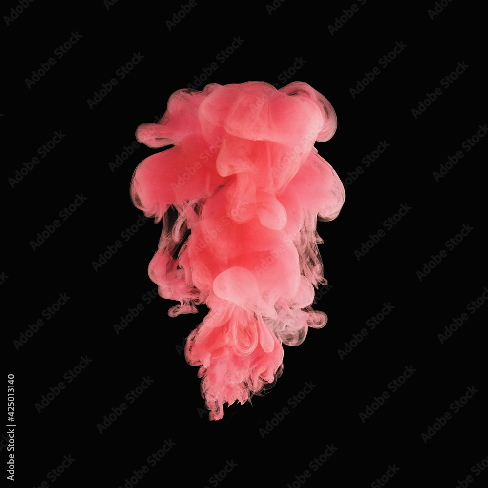 Splash of pink acrylic paint under water on a black background - Abstraction with liquid ink - The concept of change and transformation in different ways of life Splash of pink acrylic paint under water on a black background - Abstraction with liquid ink - The concept of change and transformation in different ways of life