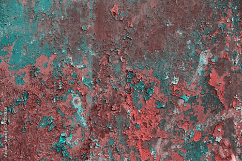 Grunge rusted metal texture  covered with old colored paint  rust and oxidized metal background. Old metal iron panel