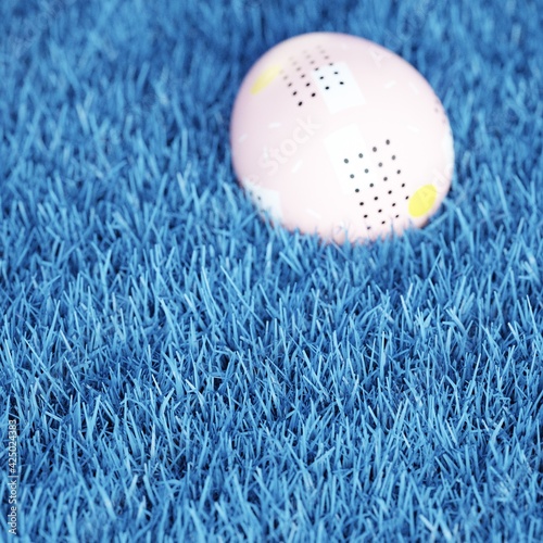 Colorful Textured Easter Eggs Lays on Shiny Blue Grass