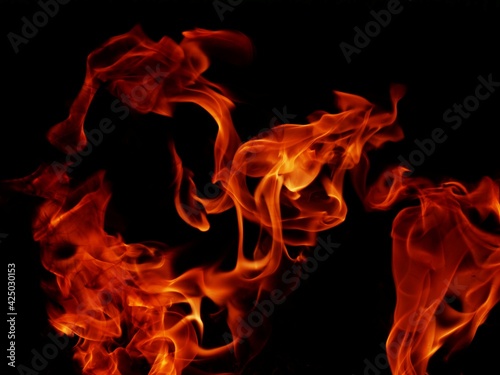 Abstract blaze fire flame texture for banner background.Strange shape lights. © sainan