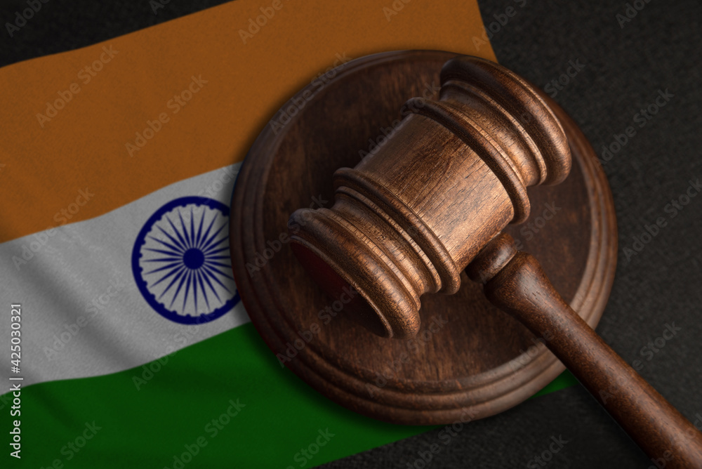 Judge gavel and flag of India. Law and justice in India. Violation of rights and freedoms
