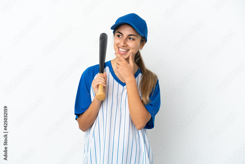 Young caucasian woman playing baseball isolated on white background looking to the side and smiling Young caucasian woman playing baseball isolated on white background looking to the side and smiling