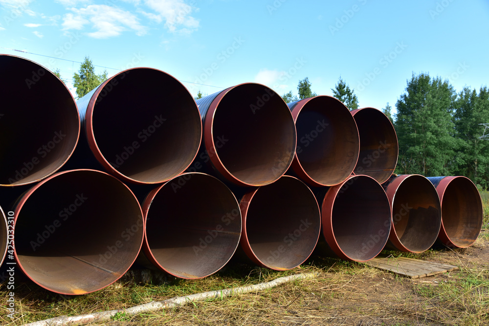 Pipes for natural gas pipeline project. Oil and gas pipelines. Fuel and energy concept. Oil pipeline that would carry tar sands for oil refineries. Fossil fuels and crude Pipes for natural gas pipeline project. Oil and gas pipelines. Fuel and energy concept. Oil pipeline that would carry tar sands for oil refineries. Fossil fuels and crude