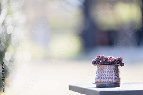 Flower pot on bistro table