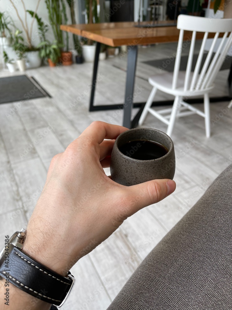 coffee in hand indoor 