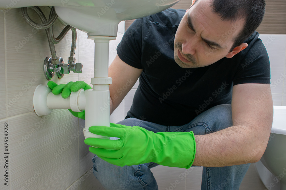 Drain Problems, blockage male floor tired sink pipe bathroom repair draining Drain Problems, blockage male floor tired sink pipe bathroom repair draining