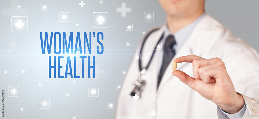 Close-up of a doctor giving a pill concept Close-up of a doctor giving a pill concept