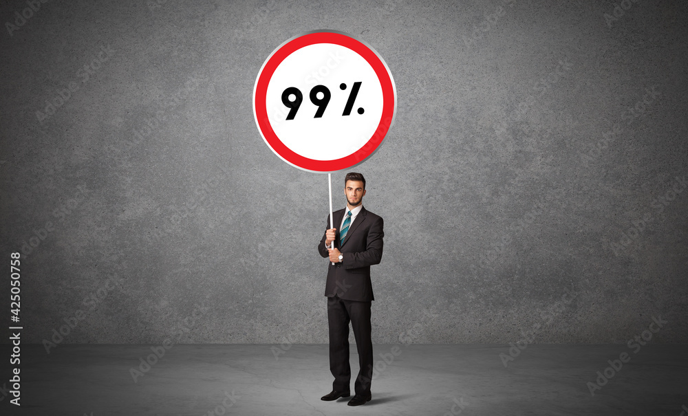 Young business person holdig traffic sign concept Young business person holdig traffic sign concept