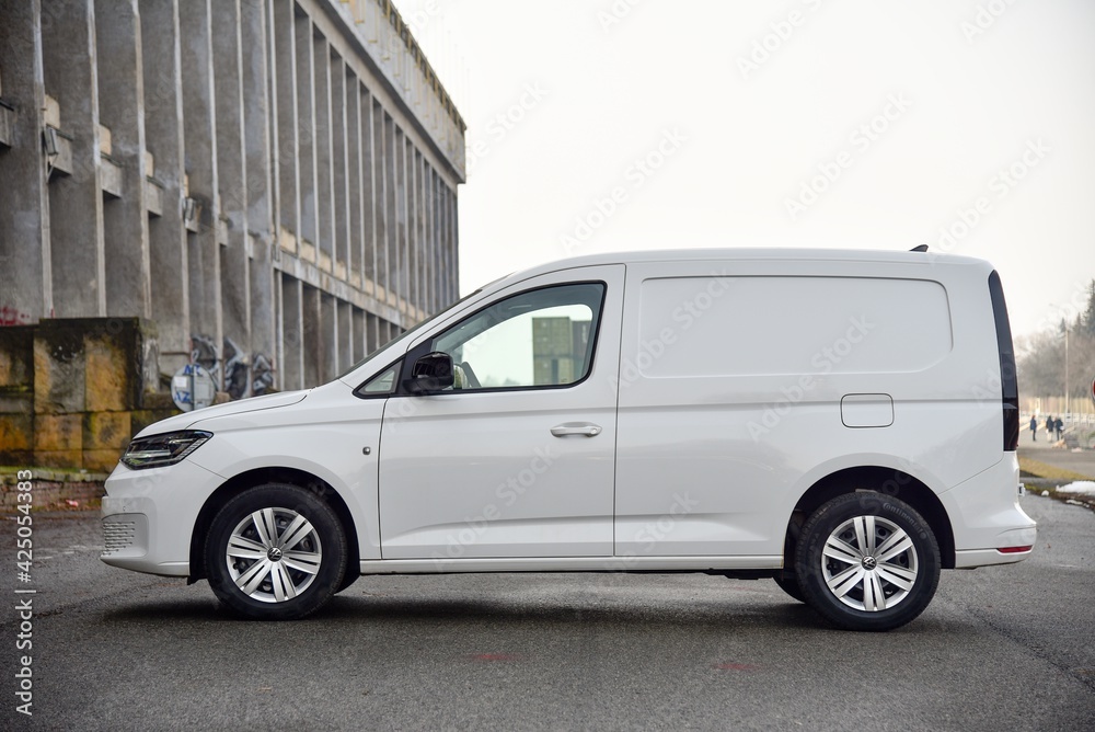 Volkswagen Caddy Cargo 2.0 TDI. Mini van with box body. Side view