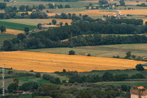 Narni Scalo (Terni, Umbria, Italy) - View of the industrial part of the city, yellow fields, agriculture, distant view