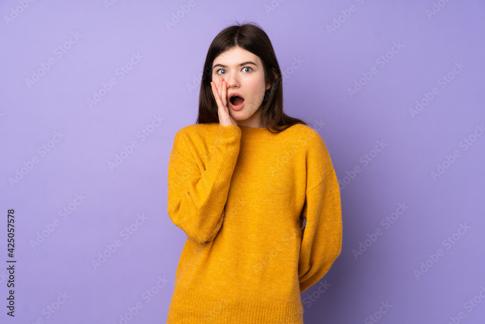 Young Ukrainian teenager girl over isolated purple background with surprise and shocked facial expression Young Ukrainian teenager girl over isolated purple background with surprise and shocked facial expression
