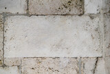 Weathered sand-lime stone as a brick partially repaired