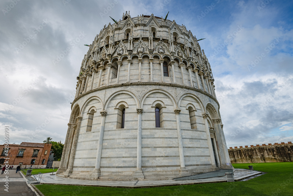View of The Pisa Baptistery on Piazza dei Miracoli in Pisa, Tuscany, Italy. Rear view