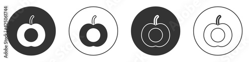 Black Peach fruit or nectarine with leaf icon isolated on white background. Circle button. Vector