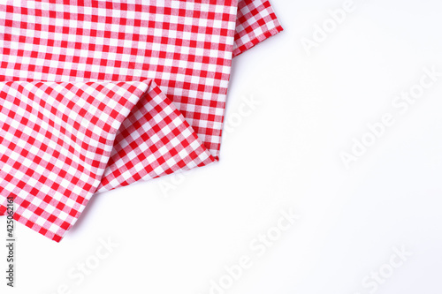 Red and white fabric scotch pattern on white background top view and with copy space. Concept textured, Background.