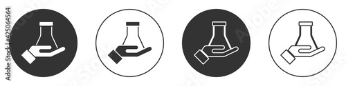 Black Test tube and flask chemical laboratory test icon isolated on white background. Laboratory glassware sign. Circle button. Vector