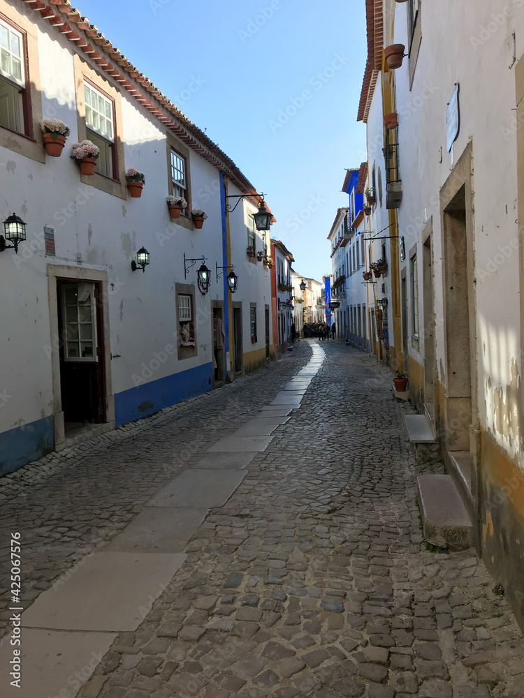 Óbidos, Portugal; 03 11 2019: White houses in the town of Óbidos..