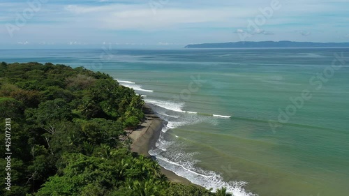 Perfect series of waves drone shot tropical paradise Costa Rica dream destination photo