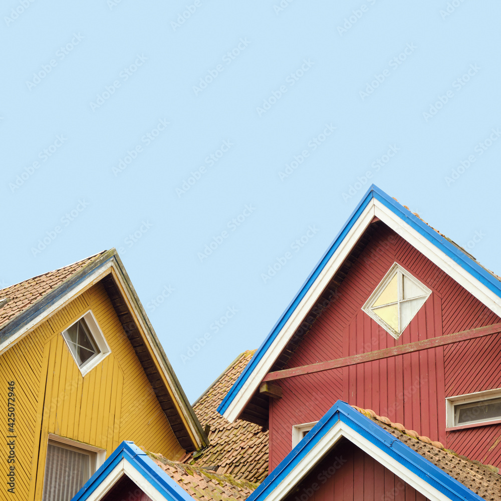 Traditional colorful wooden architecture in Nida, Lithuania, wood painted building exterior detail