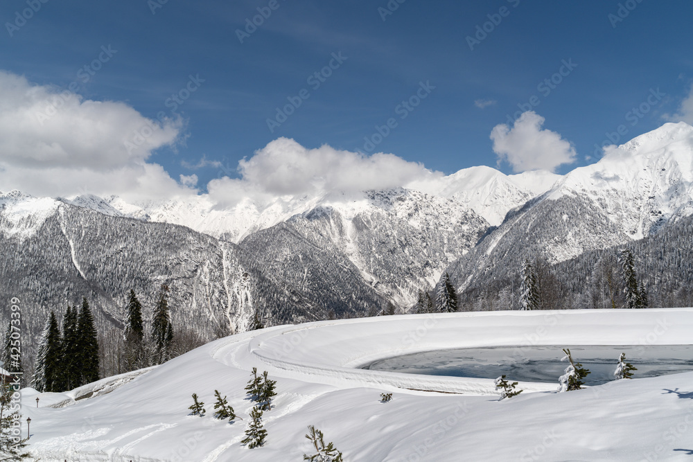 Panoramic view the caucasus mountains of the ski resort Krasnaya Polyana, Sochi, Russia.