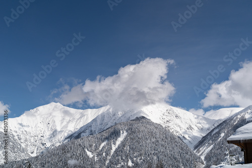 Panoramic view the caucasus mountains of the ski resort Krasnaya Polyana, Sochi, Russia.