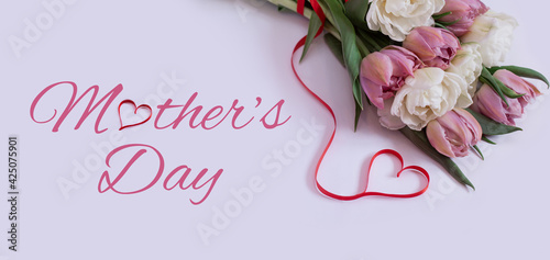 mother's day, beautiful flowers as a gift, card with a heart