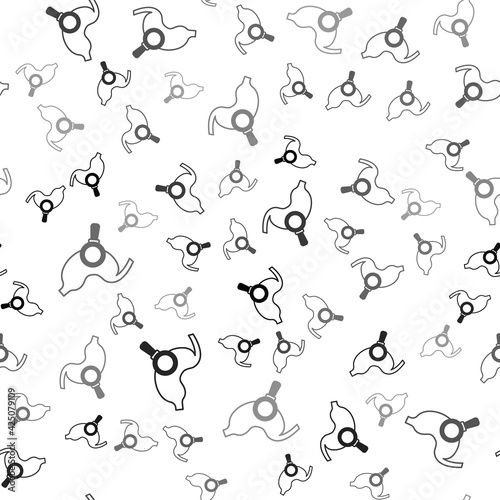 Black Human stomach with magnifying glass icon isolated seamless pattern on white background. Vector