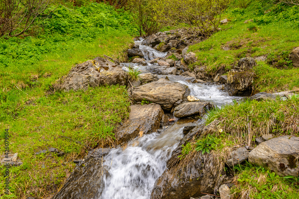 Mountain waterfall near Murren, Switzerland Mountain waterfall near Murren, Switzerland