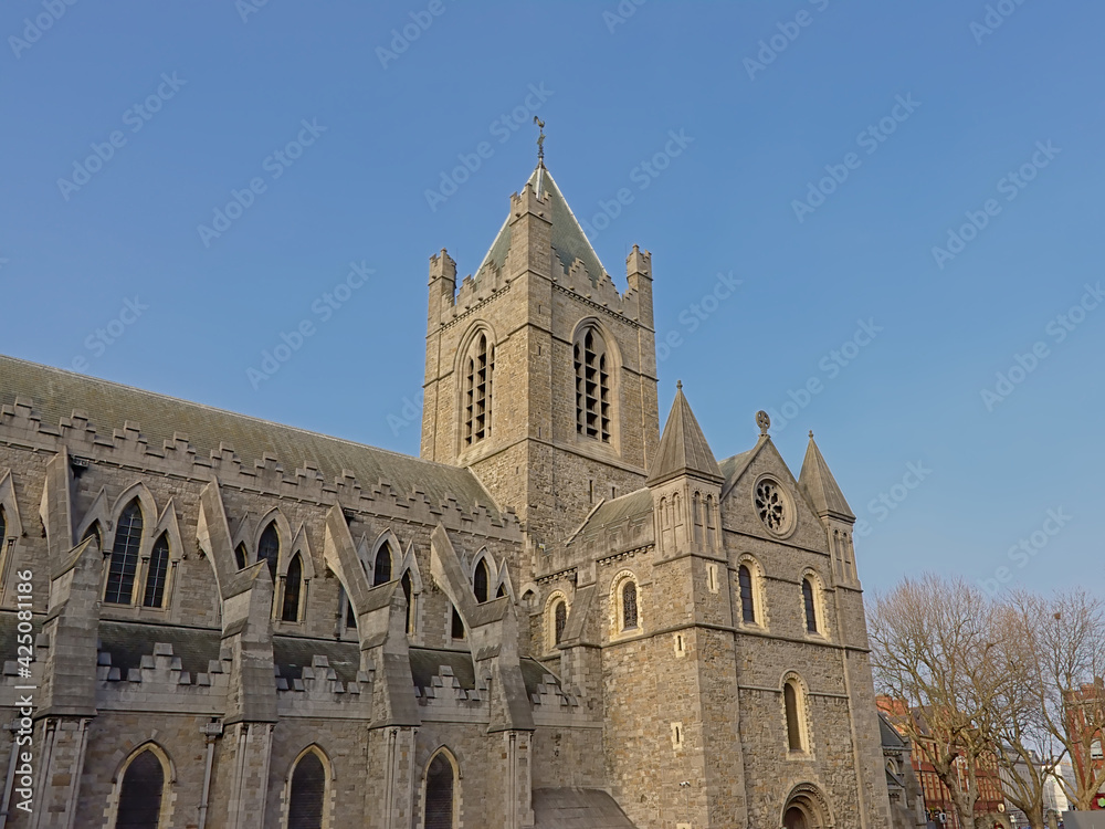 Medieval gothic architecture of Christ Church Cathedral, Dulblin, Ireland on a sunny day with clear blue sky 
