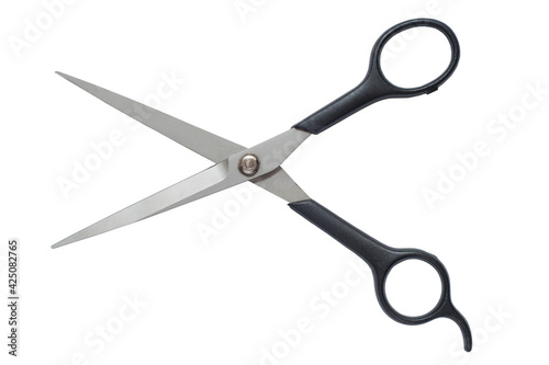 Steel scissors with black open handles isolate