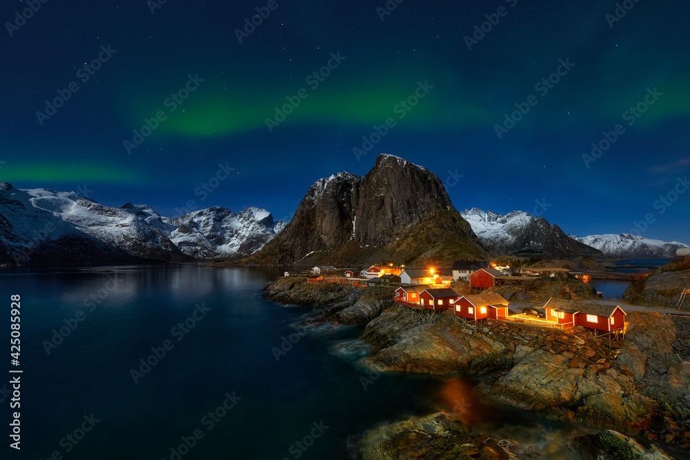 Northern lights in the village of Hamnoy, Norway, Lofoten islands, Scandinavia 