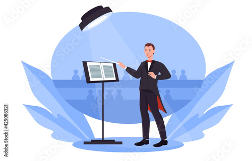 Conductor is standing on the stage under spotlight