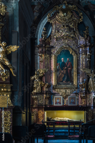 LVIV, UKRAINE - April, 2021: Saints Peter and Paul Garrison Church. Altar of the Apostles Peter and Paul with the sculpture "Christ in the Tomb". © Serhii Khomiak