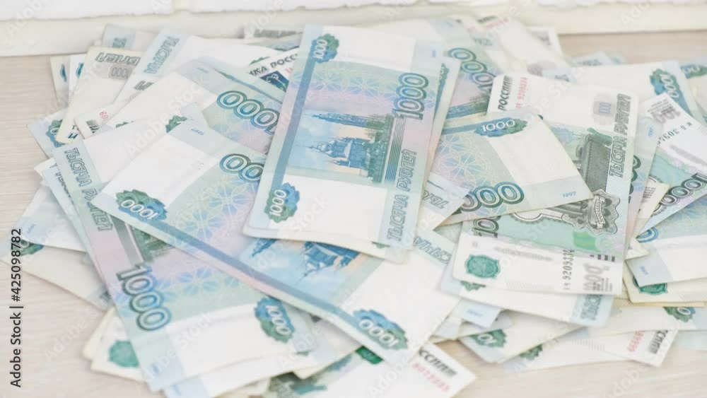 female hands are counting money, 1000 ruble bills on the background of a brick wall, a lot of cash in rubles 4k video female hands are counting money, 1000 ruble bills on the background of a brick wall, a lot of cash in rubles 4k video