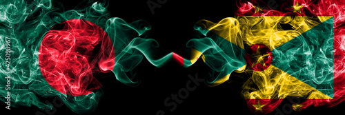 Bangladesh  Bangladeshi vs Grenada smoky mystic flags placed side by side. Thick colored silky abstract smokes flags.