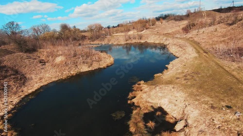 Amazing view of river after winter and forest. Top viewfrom copter. Nature, beautiful, travel, drone, scenic, panorama, tree, wilderness, natural, environment, wood, countryside. Slow motion photo