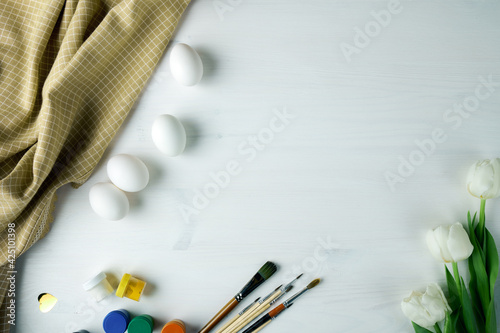 Top view on easter table. Preparation for Easter. place for text. selective focus. the process of coloring eggs 