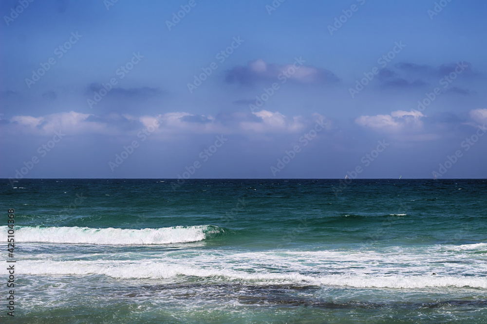 Waves in the Mediterranean Sea. Beautiful israeli seascape, wallpaper, postcard Waves in the Mediterranean Sea. Beautiful israeli seascape, wallpaper, postcard