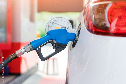 Refill and filling Oil Gas Fuel at station. Gas station - refueling. To fill the machine with fuel. Car fill with gasoline at a gas station. Gas station pump. 