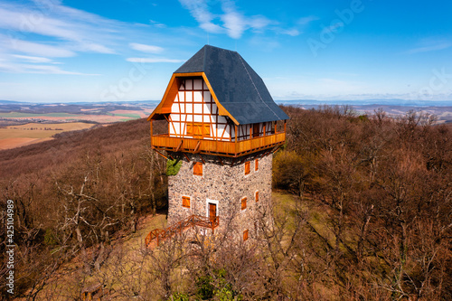 Buják, Hungary - Aerial view of the famous Sasbérc lookout tower which is the highest point of Cserhát mountain. Hungarian name is Sasbérci kilátó. photo