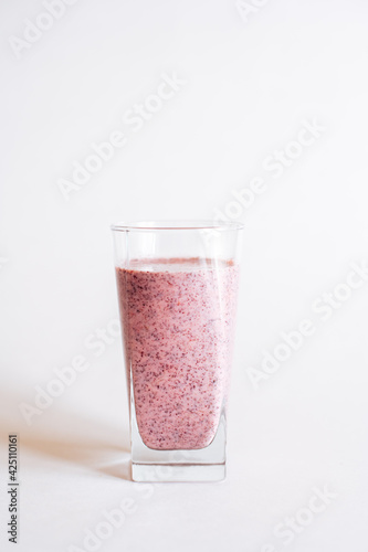 smoothies in a glass on a white table