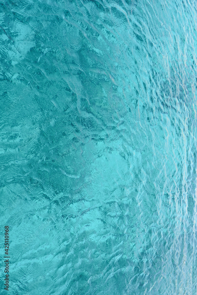 backgrounds and textures. transparent blue sea water background 