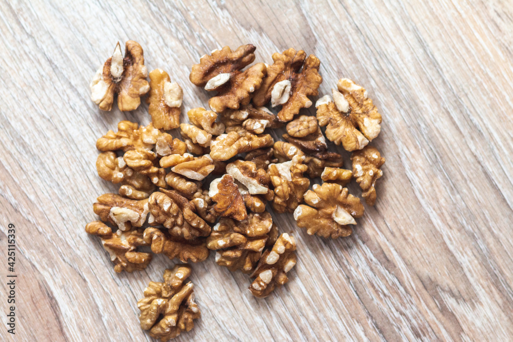 Group of walnuts on brown background
Group of walnuts on brown background