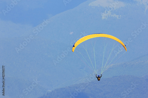 Paragliding in the mountains - extreme sports