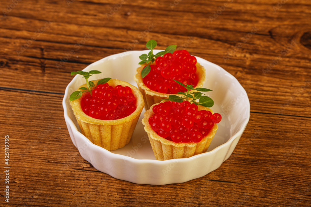 Apetizer - tartlet with red caviar Apetizer - tartlet with red caviar