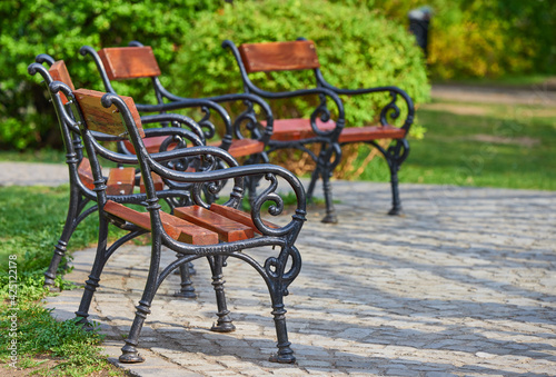 View of benches in a small park near Buda castle cathedral, Budapest, Hungary